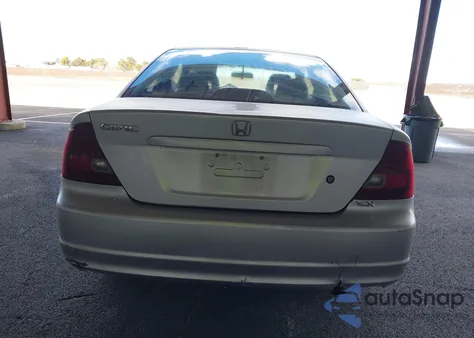 2003 Honda Civic Lx z USA, uszkodzony, nr VIN 1HGEM22533L028698